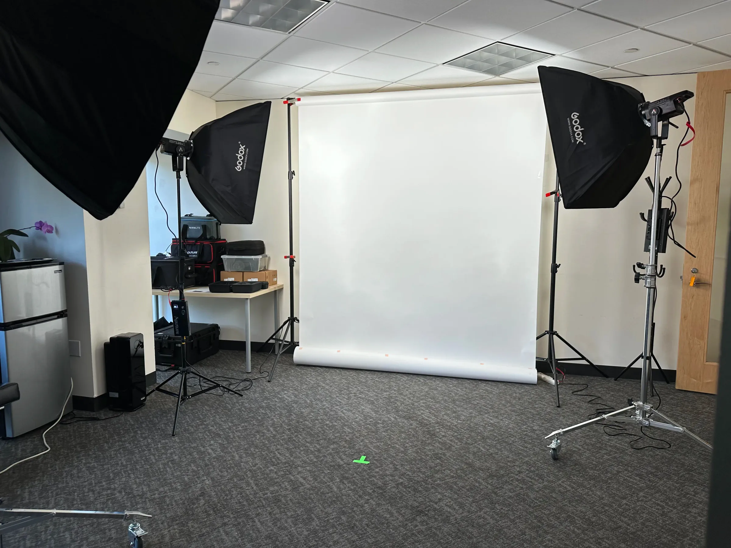 Professional studio setup with podcast and photography equipment